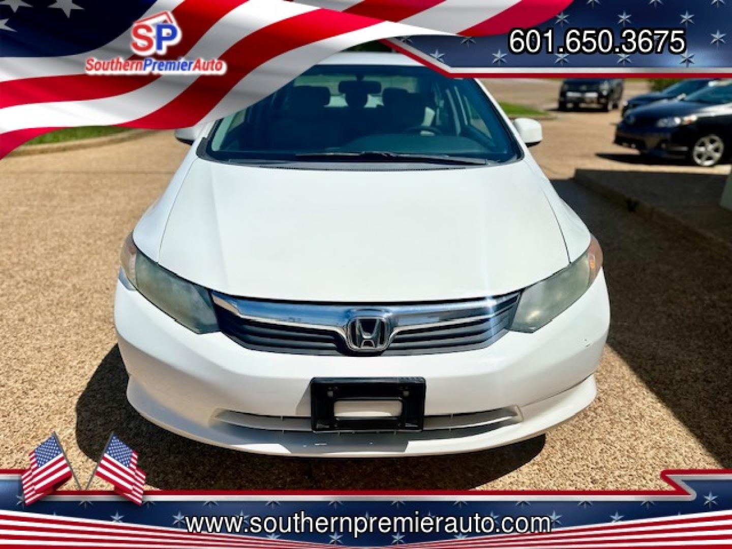 2012 WHITE HONDA CIVIC LX LX (2HGFB2F51CH) with an 1.8L L4 SOHC 16V engine, 5-Speed Automatic transmission, located at 922 W. Beacon St., Philadelphia, MS, 39350, (601) 650-3675, 32.770447, -89.127151 - Title: 2012 Honda Civic LX Sedan Year: 2012 Make: Honda Model: Civic Engine: 1.8L L4 SOHC 16V Body: SEDAN 4-DR Transmission: 5-Speed Automatic Drive Type: FWD Mpg City: 28 Mpg: 39 Trim: LX Sedan - Photo#1